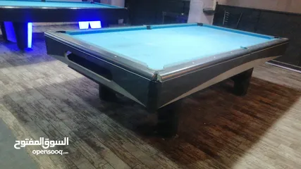  1 طاوله بلياردو اجنبيه تركيا رخام اسود 9 قدم بحاله ممتازه معها طابات و4 اساتيك