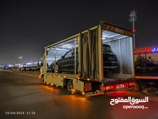  6 سطحة فل داون مغلقة لنقل السيارات من قطر الى دبي وبالعكس