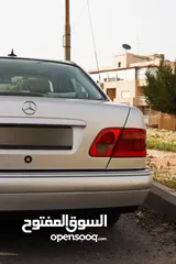  9 مرسيدس E200  موديل 1999 فل مع فتحة