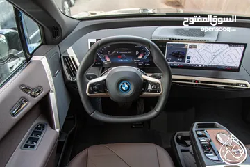  21 BMW IX40 xDrive 2024  عداد صفر، وارد و كفالة الشركة   كهربائية بالكامل  Full electric