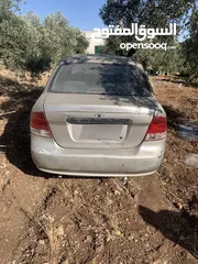  4 سياره دايو كالوس 2002بحاجهً لماتور فقط وبترجع احسن من اول