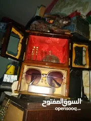  21 تحف وانتيكا واساور وحلوق وتماثيل