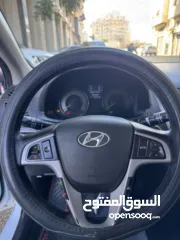  11 هونداي اكسنت 2015 محرك 1600 ديزل لون ابيض فرش جلد تشغيل بصمه حساسات خلفيه كاميرا خلفيه ترخيص وتامين