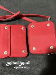  7 حقيبه صغيره لون احمر غامق
