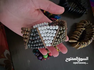  12 اساور خشبية ملونة جديدة