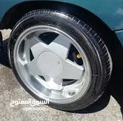  1 جنط بوربيت الماني محير اربع براغي مع كوشوك بحاله جيده