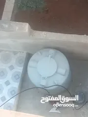  1 خزان ماء وماتور ماء وبرابيش بكس