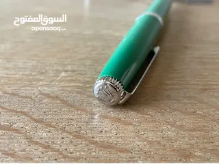  9 قلم رولكس.