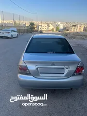  2 متسوبيشي لانسر 2004محدثه بالكامل 2013