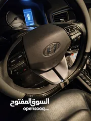 18 هيونداي ايونيك 2018 فحص للبيع لون ابيض جمرك2022 مالك واحد في الاردن