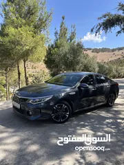  15 كيا K5 هايبرد موديل ال 2018 لون فيراني ميتالك  فحص اربعة جيد ولا ملاحظة فل كامل عدا الفتحة - كاش