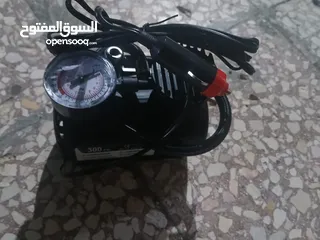  6 شاحن بطارية سيارة مع منفاخ عجل السيارة جديد مش مستعمل للبيع ......