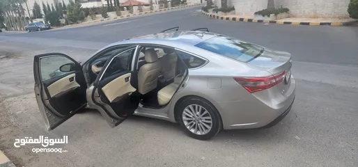  24 تويوتا افالون هايبرد 2015 فل كامل وأعلى صنف Limited وارد و مواصفات أمريكيه مالك واحد فحص كامل