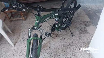  14 بسكليت جديد غير مستعمل