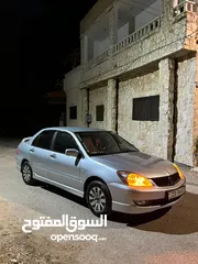  1 سيارة ميتسوبيشي لانسر 2004 محدثه بلكامل 2013