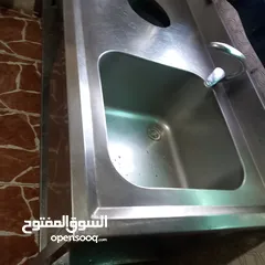  15 مجلى ستيلس ثقيل صناعي  ثلاجة بحاجه الى مروحة  طاوله ستيلس  غاز عين وحدة كانون كبير طول مترين عرض 40س