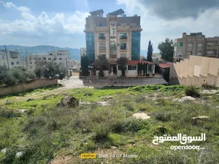  1 ارض 1043م مميزة للبيع عمان بالقرب من شارع المطار وجامعة البتراء (ناعور حوض ام عريجات)