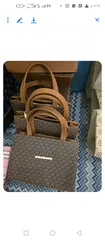  10 ماركت مايكل كورس.LV.شانيل