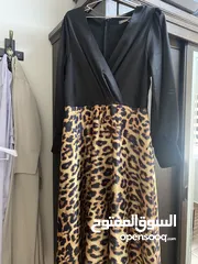  2 فستان رسمي قماس ستان ثقيل اسود مع تايجر من مكه مول استعمال مره واحده فقط بحالة الجديد جدا