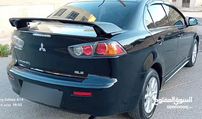  19 متسوبيشي لانسر فراشة موديل 2015 فحص مرفق مع الصور بحالة الوكاااااالة  ماشية 49 الف km  أصلي