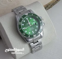  33 رولكس رجالي مرفق علبه وكيس رولكس وكفاله سنه