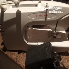  13 ماكينة خياطة singer