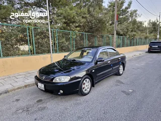  1 كيا سبكترا MR لون اسود 2003