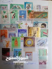  14 طوابع من جميع دول العالم بنص دينار فقط