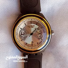  4 swatch irony ساعة