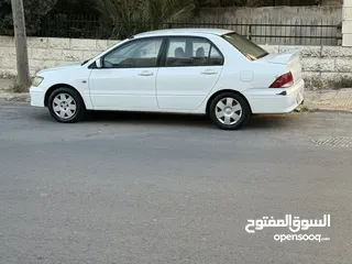  1 ميتسوبيشي لانسر 2003