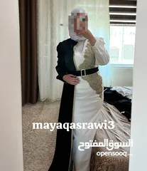 2 فستان ابيض و اسود ملبوس مره وحده بجنن عاللبس  بلبس لوزن 70 كيلو