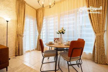  9 دبي لاند SKYCOURT  غرفة وصالة  مفروشة  سوبرلوكس مع بلكونه-إيجار شهري شامل