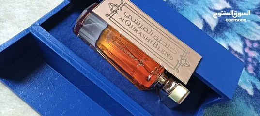  9 عطر خلطه القرشي جديد90مل للرجال والنساء  مع ستاند خشب لون ازرق