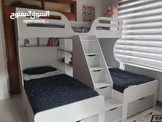  27 تخت طابقين ثلاثي مكفول 5 سنوات بحمل 150 كيلو  الخشب لامنيت مسمك ع خمالتين 3.5 سم
