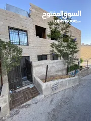  2 فرصة استثمارية وسكنية مميزة في ماركا الجنوبية – عمّان ( بيت مع ثلاث محلات للبيع )