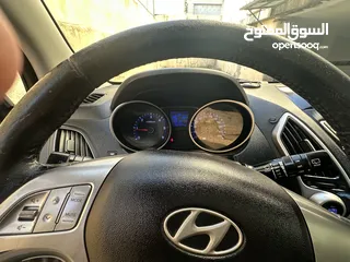  21 2009 ‏Hyundai توسان LX20 اربع ابواب، اللون فيراني، الكراسي جلد والسيارة 92,000 كيلو فقط وبحالة رائعة