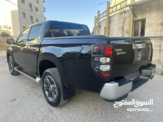  5 ميتسوبيشي L200 سبورتيرو موديل 2022 أعلى صنف مع ديفلوك للبيع