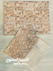  2 اقمشه من الهند الي عمان