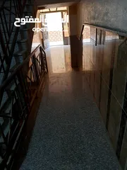  12 شقة أرضية قرب جامعة اليرموك