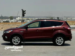  5 Ford Escape  / 2018 /  v4 perfect condition  / 28000 aed /