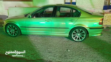  2 سيارة بي ام للبيع ذهبي 328i   E46 موديل 2000