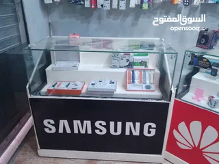 6 بضاعة محل إتصالات