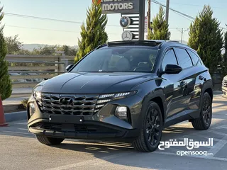  4 هونداي توسان هايبرد  بلاك ايديشن كامل الاضفات لون مميز  سنة الصنع 2022