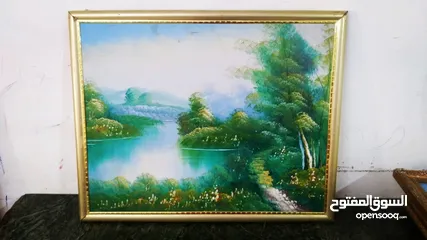  11 لوحات  رسم زيتي.. وتطريز