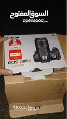  7 كاميرا للبيع CANON EOS 2000D مستعملة كسر زيرو الكرتونة جميع مشتملاتها شكلها كالجديد وعدسة 50 STM