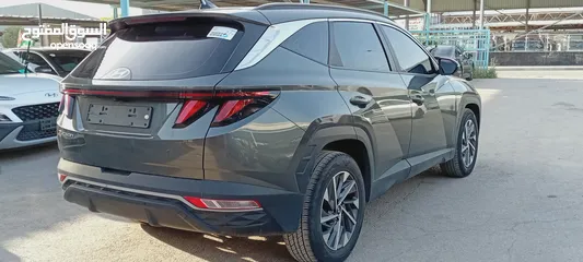  13 Hyundai Tucson hybrid 2021  هيونداي توسان هايبرد 2021  . وارد كوريا الجنوبية  . فحص 7 جيد -