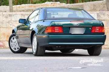  7 Mercedes SL320 1995 بحالة الوكالة