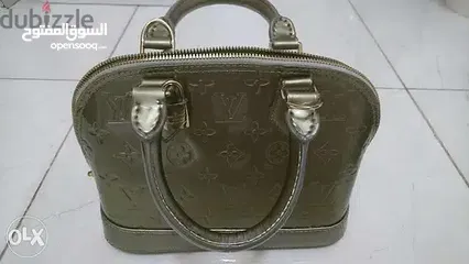  1 LV purseحقيبة أل في ألما