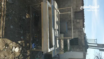  18 بواب شبابيك مطابخ مراجيح  بواب سحاب ماكنات خياطه ماكنات طباعه ماكنات تصوير وثائق خزانات ستيل