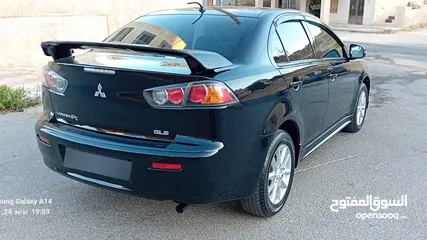 24 متسوبيشي لانسر فراشة موديل 2015 فحص مرفق مع الصور بحالة الوكاااااالة  ماشية 49 الف km  أصلي
